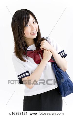 A high school girl smiling View Large Photo Image Stock Image - A high school girl smiling. Fotosearch