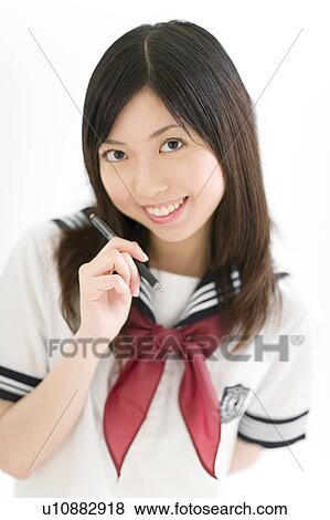 Stock Photo - A high school girl smiling. Fotosearch