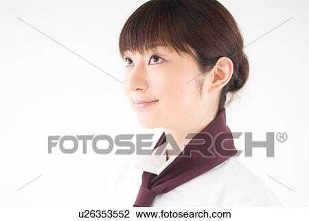 A waitress looking up View Large Photo Image Stock Image - A waitress looking up. Fotosearch