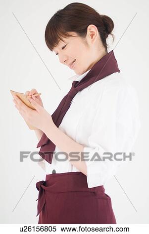 Stock Photography - A waitress taking order. Fotosearch