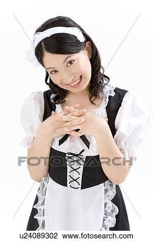 A young woman in French maid outfit smiling View Large Photo Image Stock Image - A young woman in French maid outfit smiling. Fotosearch
