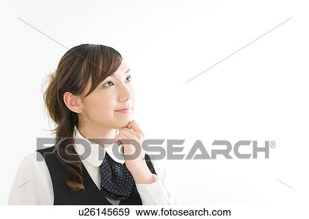 A young woman in uniform thinking View Large Photo Image Stock Photo - A young woman in uniform thinking. Fotosearch