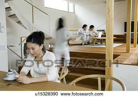 Family relaxing at home, blurred motion View Large Photo Image Stock Image - Family relaxing at home, blurred motion. Fotosearch