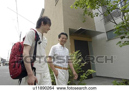 Father walking with son View Large Photo Image Picture - Father walking with son. Fotosearch