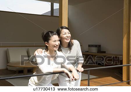 Stock Image - Mother and daughter talking. Fotosearch