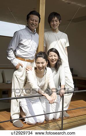 Picture - Portrait of a family with adult children. Fotosearch