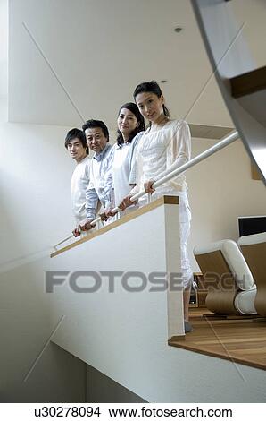 Picture - Portrait of a family with adult children. Fotosearch