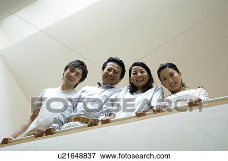 Portrait of a family with adult children View Large Photo Image Stock Photo - Portrait of a family with adult children. Fotosearch