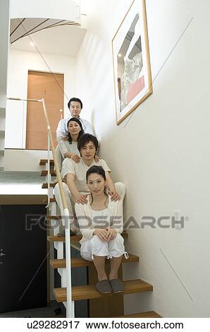 Portrait of a family with adult children View Large Photo Image Stock Photo - Portrait of a family with adult children. Fotosearch