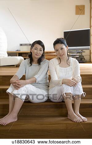 Stock Image - Portrait of mother and daughter. Fotosearch