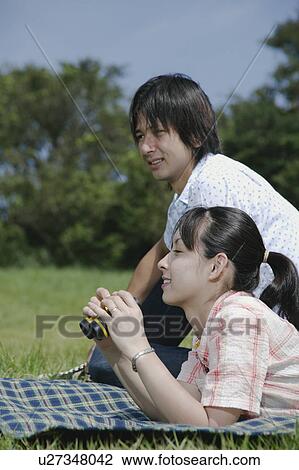 Young man eating kebab outside View Large Photo Image Stock Image - Young man eating kebab outside. Fotosearch