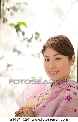 Picture - Portrait of a young woman wearing yukata. Fotosearch