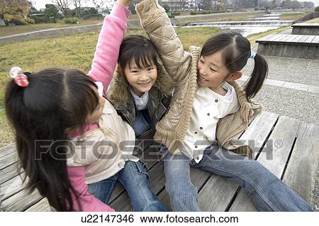 Children playing in park View Large Photo Image Stock Photograph - Children playing in park. Fotosearch