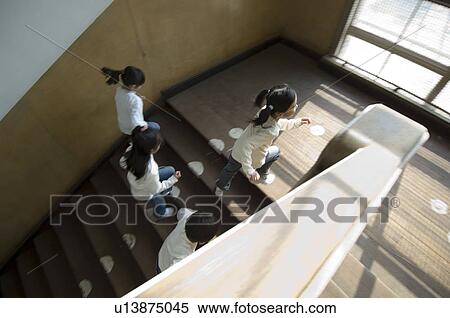 Children running up staircase View Large Photo Image Stock Photography - Children running up staircase. Fotosearch