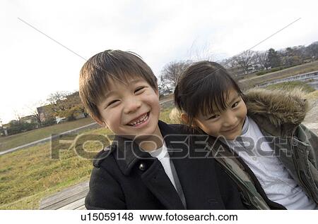 Stock Photo - Children smiling. Fotosearch