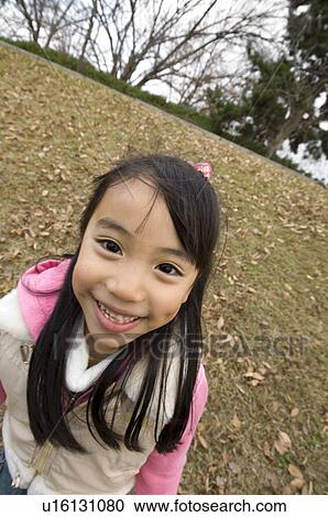 Girl smiling View Large Photo Image Stock Image - Girl smiling. Fotosearch