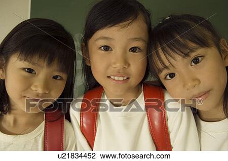 Three girls smiling View Large Photo Image Stock Image - Three girls smiling. Fotosearch