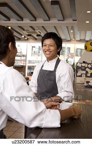 Stock Photo - Chefs talking. Fotosearch