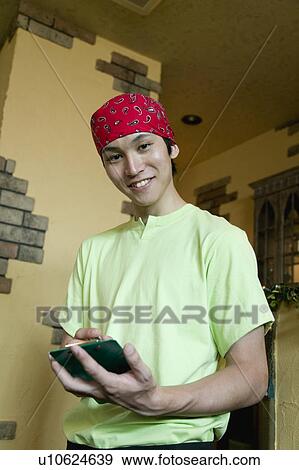 Stock Photo - Waiter taking order. Fotosearch