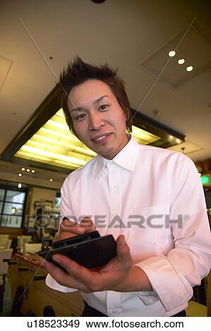 Stock Photo - Waiter taking order. Fotosearch