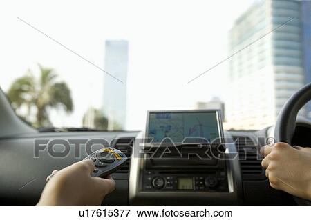 Woman's hand using GPS View Large Photo Image Stock Photo - Woman's hand using GPS. Fotosearch