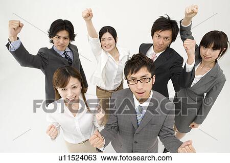 Stock Image - Business people cheering. Fotosearch