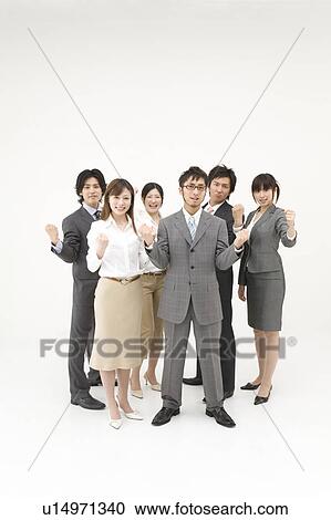 Stock Image - Business people cheering. Fotosearch