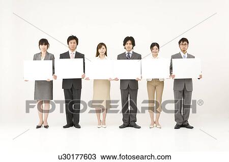 Business people holding blank placards View Large Photo Image Stock Image - Business people holding blank placards. Fotosearch