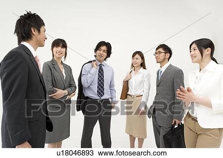 Stock Image - Business people talking. Fotosearch