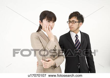 Stock Photo - Businessman consoling his colleague. Fotosearch