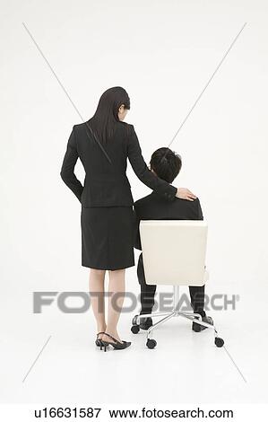 Businesswoman consoling her colleague View Large Photo Image Stock Photo - Businesswoman consoling her colleague. Fotosearch