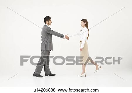 Two business people shaking hands View Large Photo Image Stock Photo - Two business people shaking hands. Fotosearch