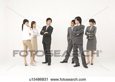 Business people glaring at each other View Large Photo Image Stock Image - Business people glaring at each other. Fotosearch