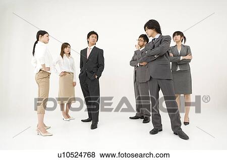 Business people glaring at each other View Large Photo Image Stock Photo - Business people glaring at each other. Fotosearch