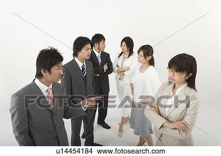 Picture - Businessmen opposite businesswomen. Fotosearch