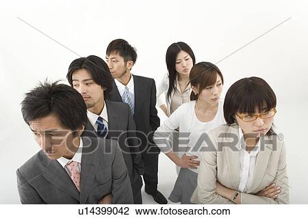 Stock Image - Businessmen opposite businesswomen. Fotosearch