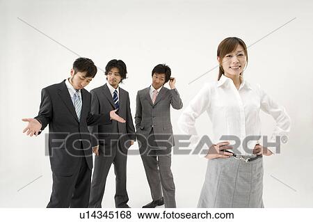 Businesswoman and three businessmen View Large Photo Image Stock Photo - Businesswoman and three businessmen. Fotosearch