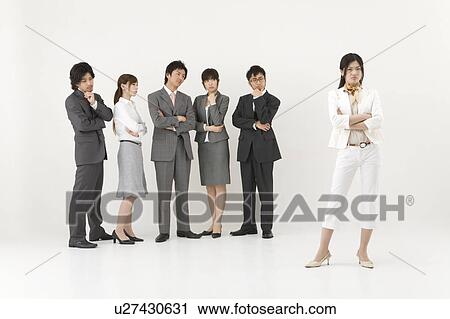 Businesswoman excluded from group of business people View Large Photo Image Stock Image - Businesswoman excluded from group of business people. Fotosearch