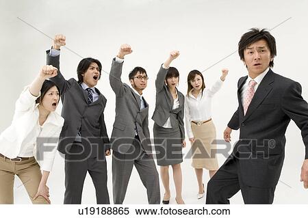 Stock Photography - Group of business people shouting at colleague. Fotosearch