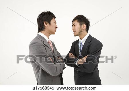 Two businessmen arguing View Large Photo Image Stock Photography - Two businessmen arguing. Fotosearch