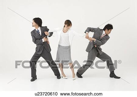 Stock Image - Two businessmen fighting over woman. Fotosearch