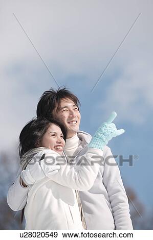 Stock Photo - Young couple smiling. Fotosearch