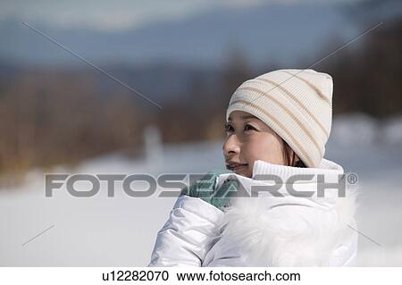 Stock Image - Young woman smiling. Fotosearch