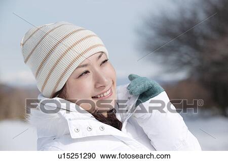 Young woman smiling View Large Photo Image Stock Image - Young woman smiling. Fotosearch