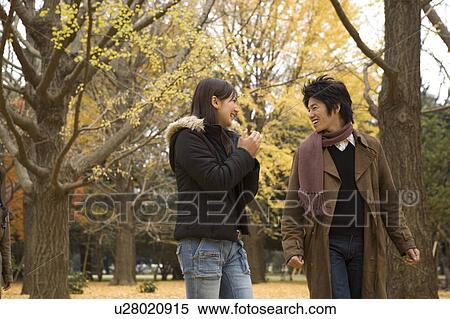 Stock Photography - Young couple walking. Fotosearch