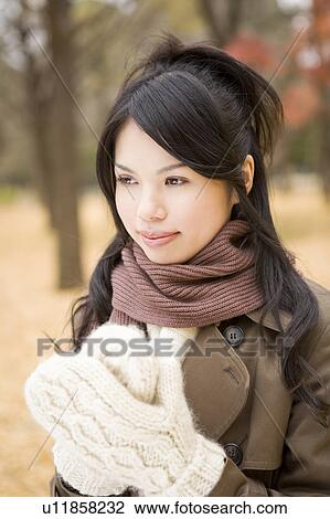 Stock Image - Young woman smiling. Fotosearch