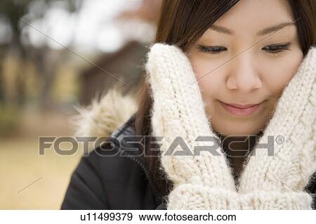 Stock Photo - Young woman smiling. Fotosearch