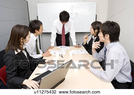 Group of business people having meeting View Large Photo Image Stock Image - Group of business people having meeting. Fotosearch