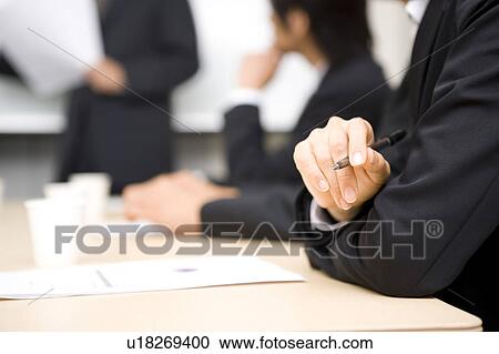 Group of business people having meeting View Large Photo Image Stock Image - Group of business people having meeting. Fotosearch