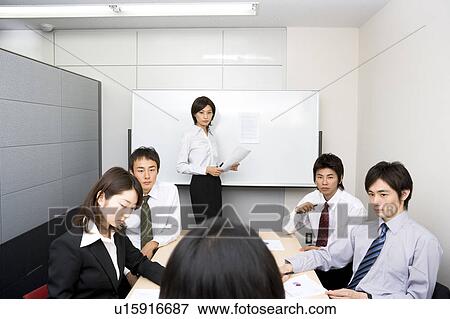Group of business people having meeting View Large Photo Image Stock Photo - Group of business people having meeting. Fotosearch